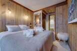 Experience rustic elegance in this stunning bedroom.