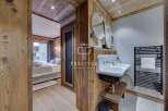 Experience luxury living in this stunning property, featuring exquisite wooden accents throughout.