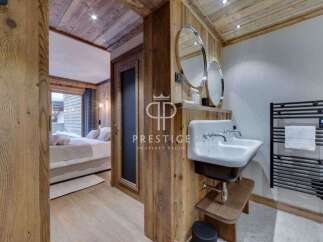 Experience luxury living in this stunning property, featuring exquisite wooden accents throughout.