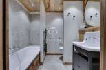 Discover a luxurious bathroom with a rustic touch.