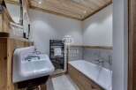 Discover a luxurious bathroom with a rustic charm.