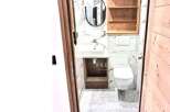 Discover a stylish bathroom with modern fixtures and a sleek design.