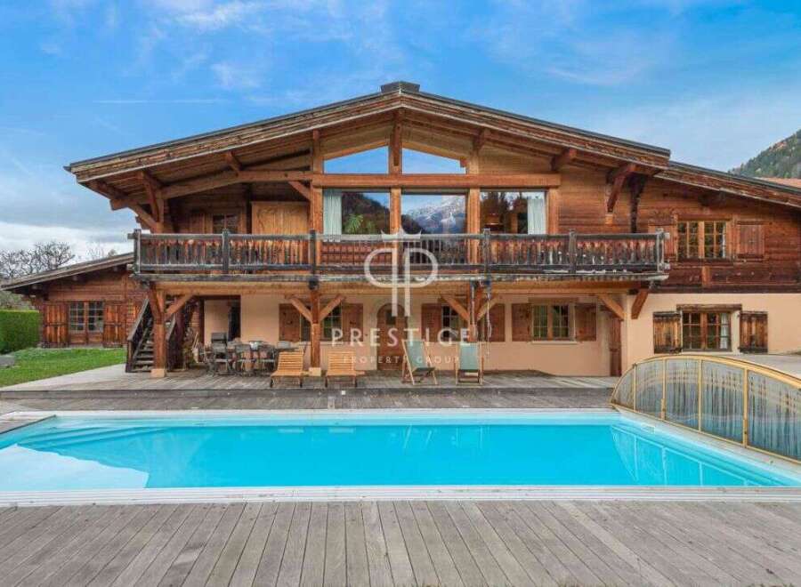 Discover luxury living in this stunning wooden chalet, complete with a private pool and breathtaking mountain views.