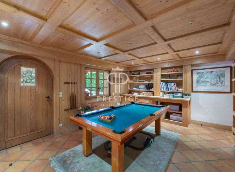 Step into luxury with this stunning property featuring a dedicated game room.