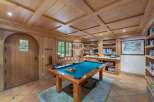 Step into luxury with this stunning property featuring a dedicated game room.