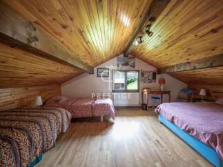 Discover a charming attic bedroom with a cozy atmosphere.