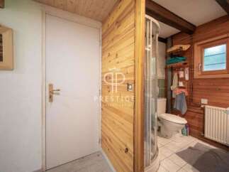 Discover a charming bathroom with a unique wooden design.