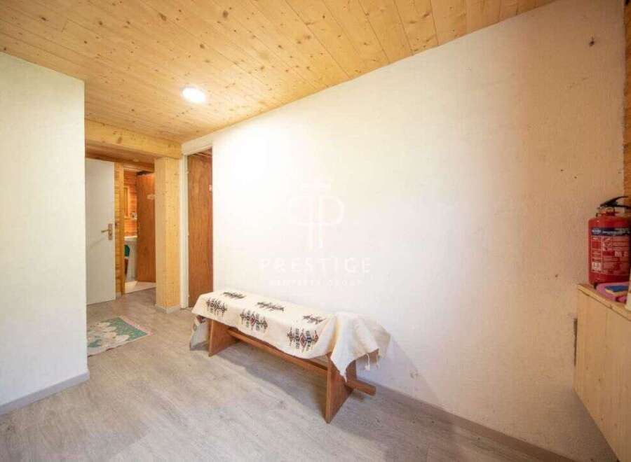 Discover a cozy interior with wooden accents and a welcoming atmosphere.