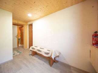 Discover a cozy interior with wooden accents and a welcoming atmosphere.