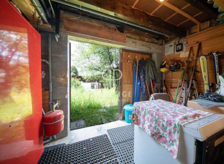 Explore this charming property with a unique storage space.