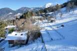 Discover a stunning mountain retreat nestled in a picturesque winter wonderland.