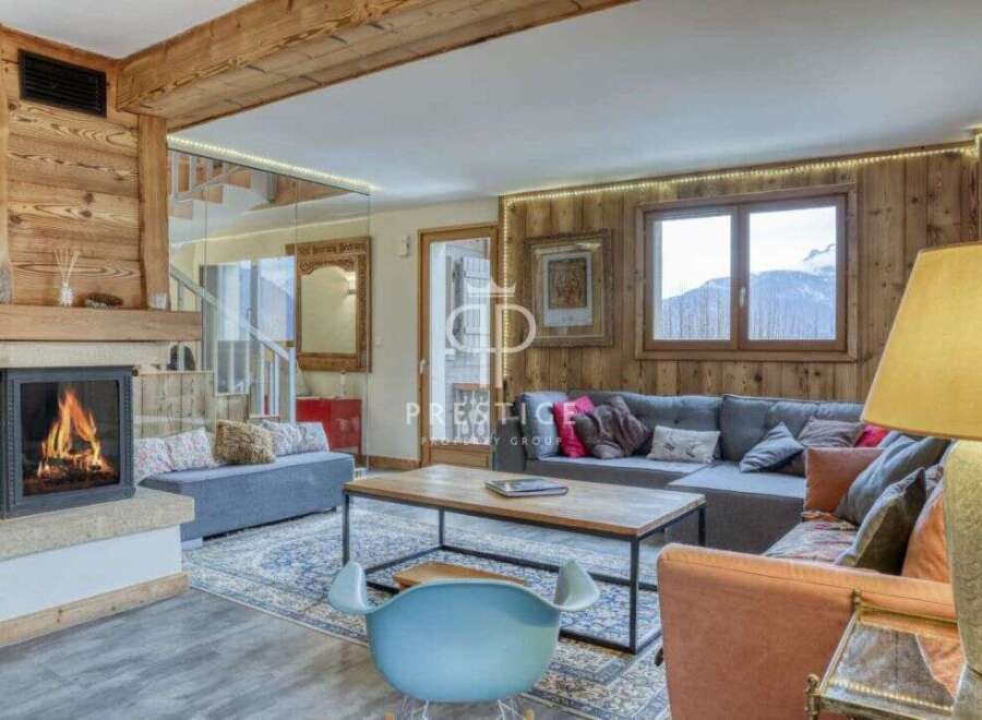 Experience the warmth of this stunning property, featuring a cozy fireplace and inviting living spaces.