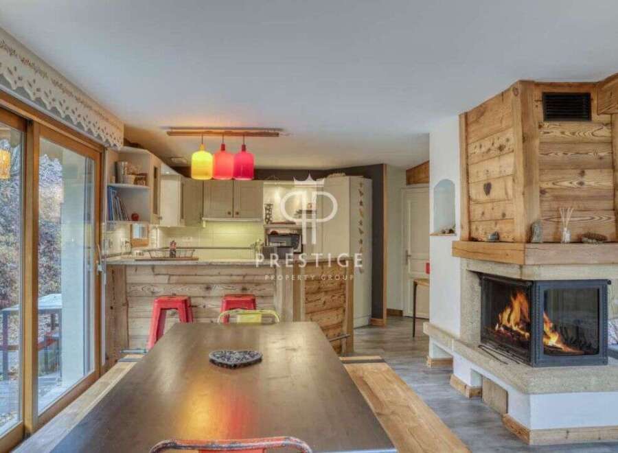 Discover the charm of this cozy property, featuring a stunning fireplace that adds warmth and character.