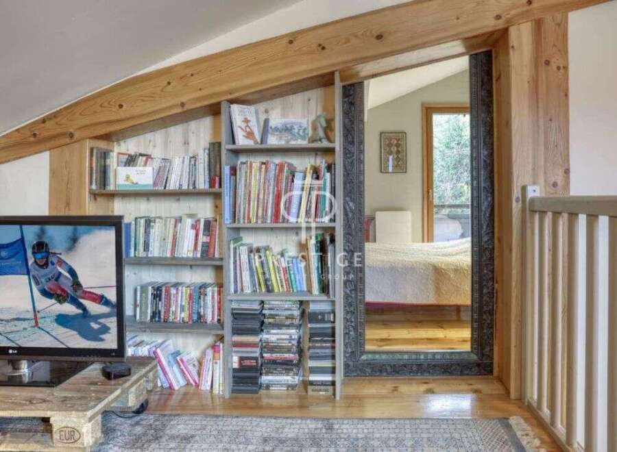Discover a cozy retreat with this charming property, featuring a unique blend of rustic and modern design.