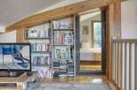 Discover a cozy retreat with this charming property, featuring a unique blend of rustic and modern design.