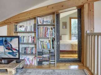 Discover a cozy retreat with this charming property, featuring a unique blend of rustic and modern design.