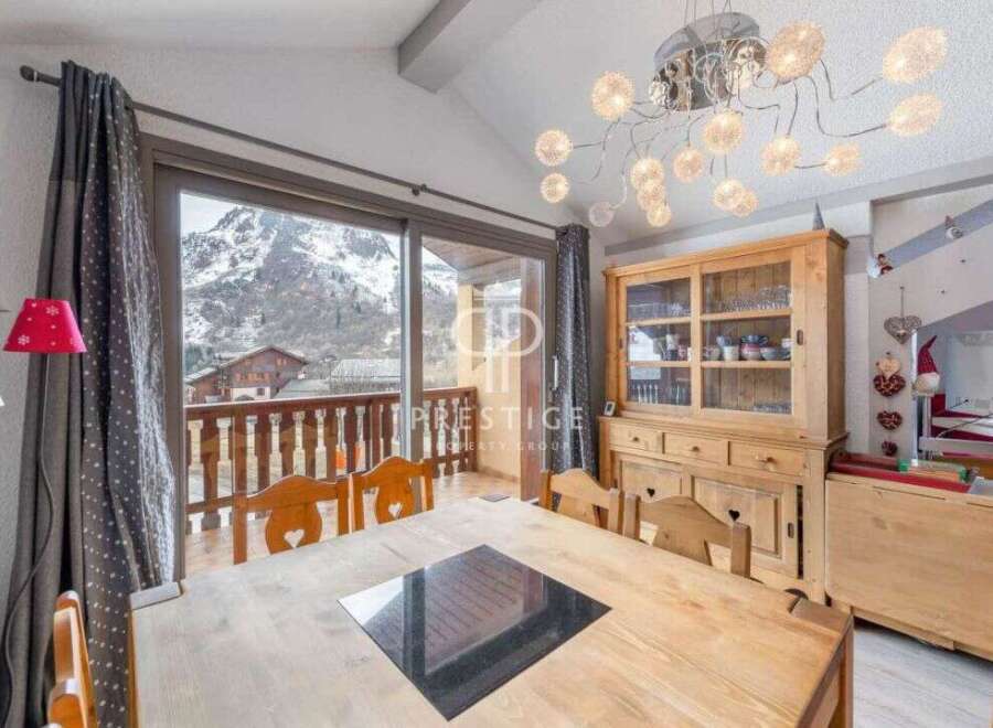 Experience breathtaking mountain views from this charming property.