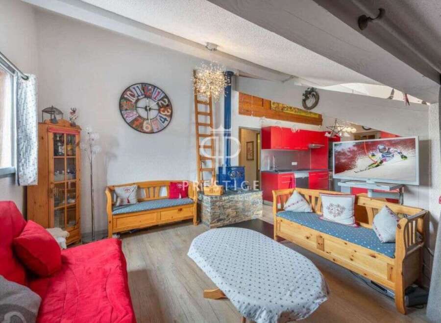 Discover a cozy living space with a unique blend of rustic charm and modern amenities.