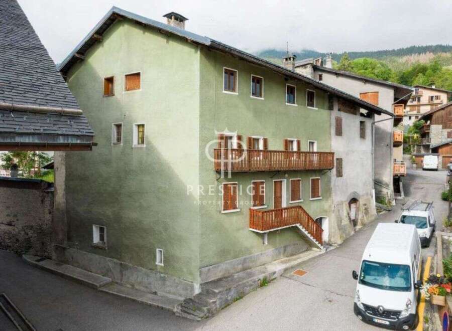 Discover a charming property with a unique architectural design.