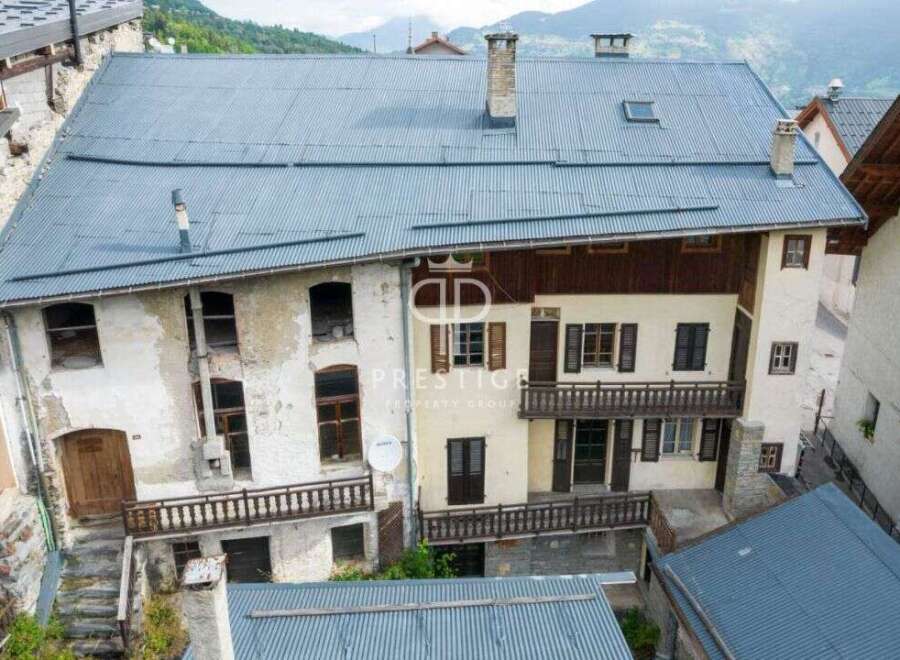 Discover a charming property with a unique architectural design.