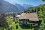 Discover a stunning property nestled in the heart of the mountains, offering breathtaking views.