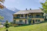 Discover a stunning property nestled in a picturesque mountain setting.