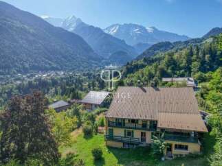 Discover a stunning property nestled in the heart of the mountains, offering breathtaking views and a serene atmosphere.