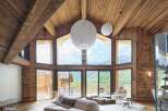 Experience luxury living in this stunning property, featuring exquisite wooden architecture and breathtaking mountain views.
