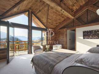 Experience luxury living in this stunning property, featuring a breathtaking mountain view.