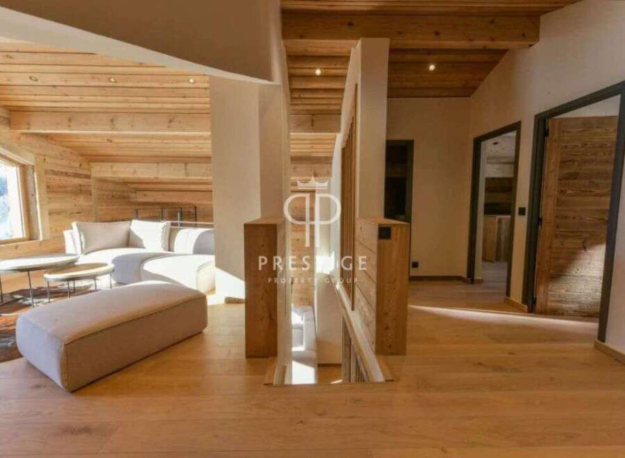 Discover luxury living in this stunning property, showcasing exquisite wooden finishes throughout.