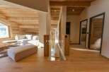 Discover luxury living in this stunning property, showcasing exquisite wooden finishes throughout.