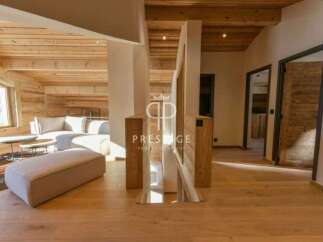 Discover luxury living in this stunning property, showcasing exquisite wooden finishes throughout.