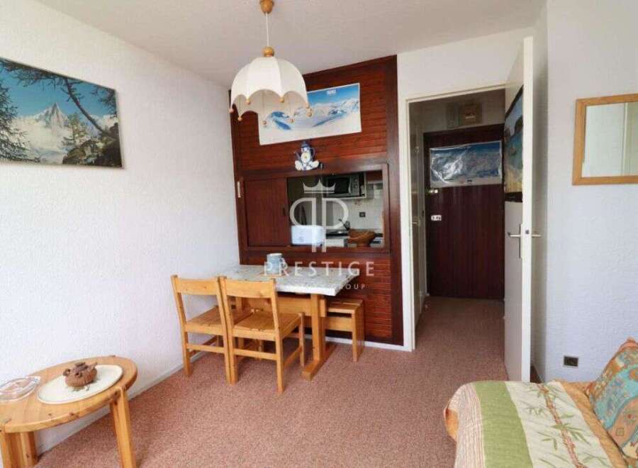 Cozy apartment with a charming dining area, perfect for intimate meals.