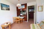 Cozy apartment with a charming dining area, perfect for intimate meals.