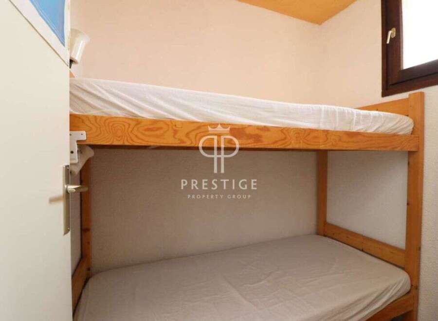 Cozy bunk beds offer a space-saving solution in this charming property.