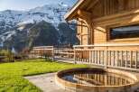 Escape to a luxurious mountain chalet with stunning views.