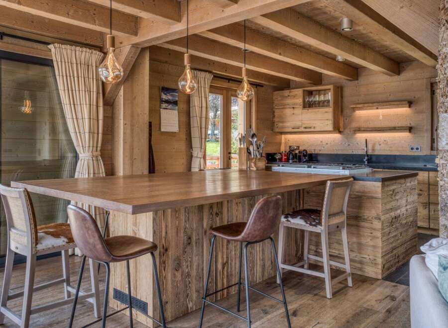 Experience rustic charm in this stunning wooden kitchen.