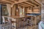 Experience rustic charm in this stunning wooden kitchen.