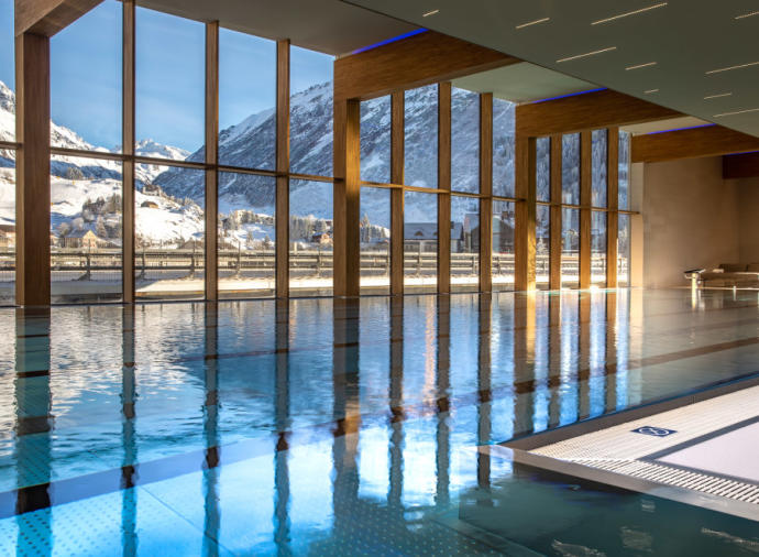 Looking for a stylish ski studio in Switzerland? This brand new development comes with hotel-style facilities and a pool with a view.