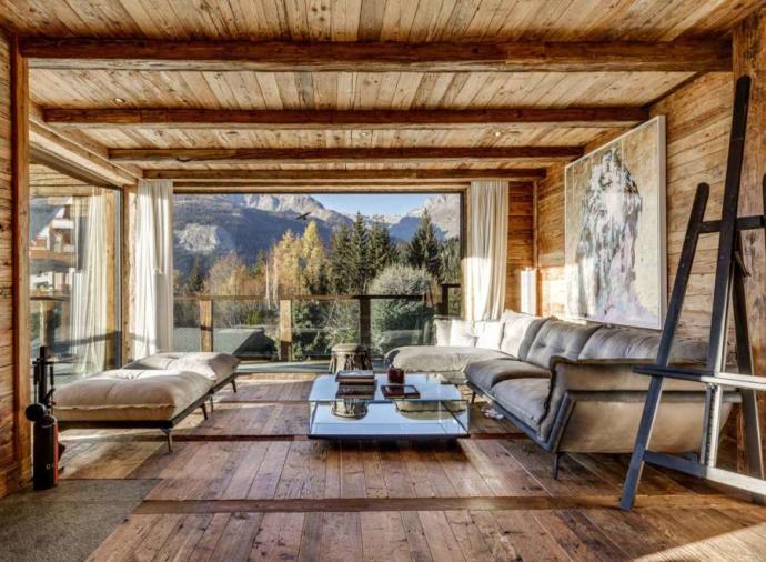 This ski chalet in Crans Montana is all about light