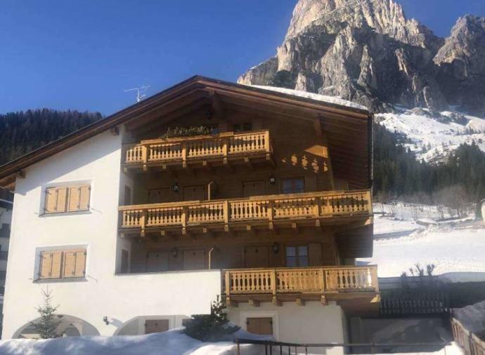 A large alpine style apartment with garage, ski storage, private sauna at Corvara in Alta Badia, South Tyrol in Italy. Conveniently located for good access to all key amenities and ski lifts.