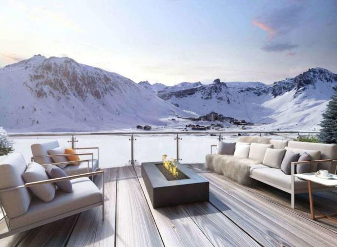 Start your ski season n style from this exceptional ski apartment in Tignes - complete with lake view