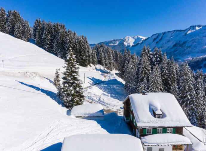 Exterior of a ski property in the mountains in Damuls Mellau, Vorarlberg, Austria. 