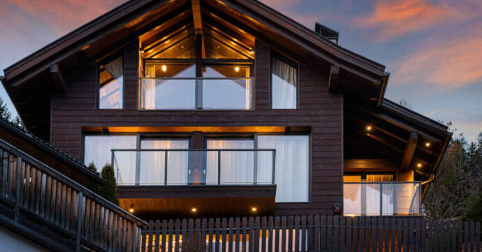 Wooden chalet at sunset